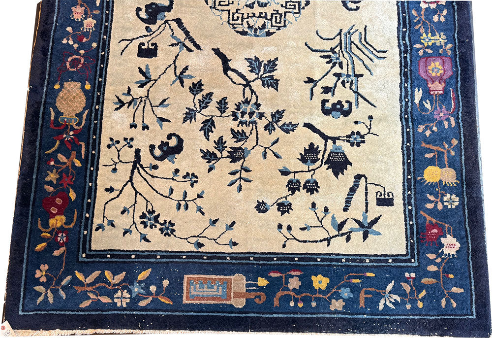 An Antique 5' x 8' Unusual Chinese Peking Rug