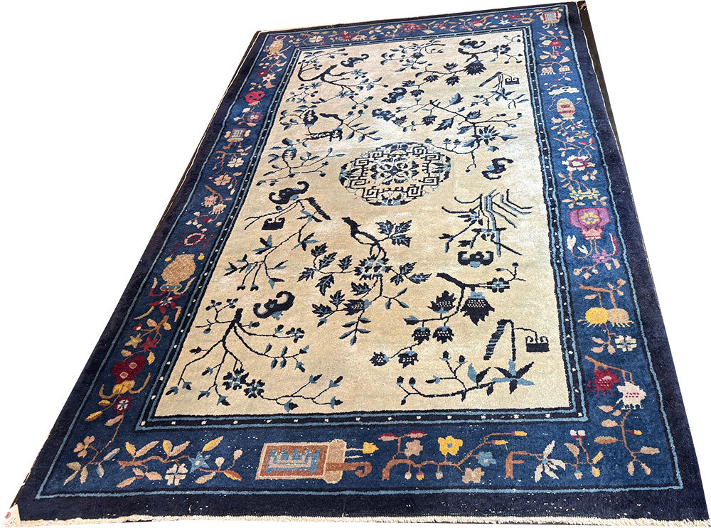 An Antique 5' x 8' Unusual Chinese Peking Rug