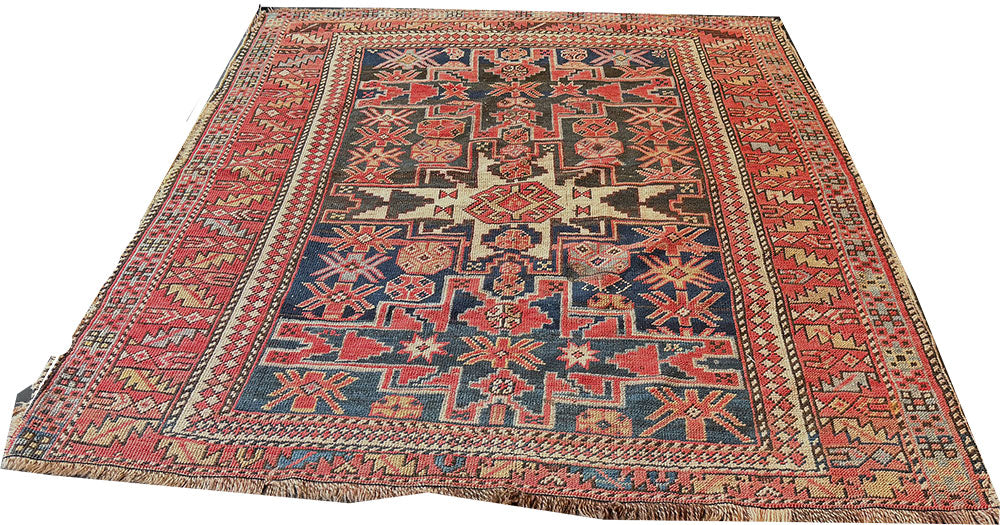 An Antique Caucasian Lesghi Star Area Rug