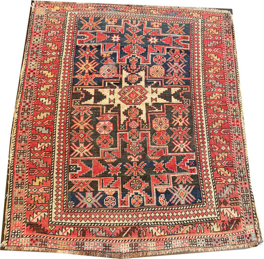 An Antique Caucasian Lesghi Star Area Rug