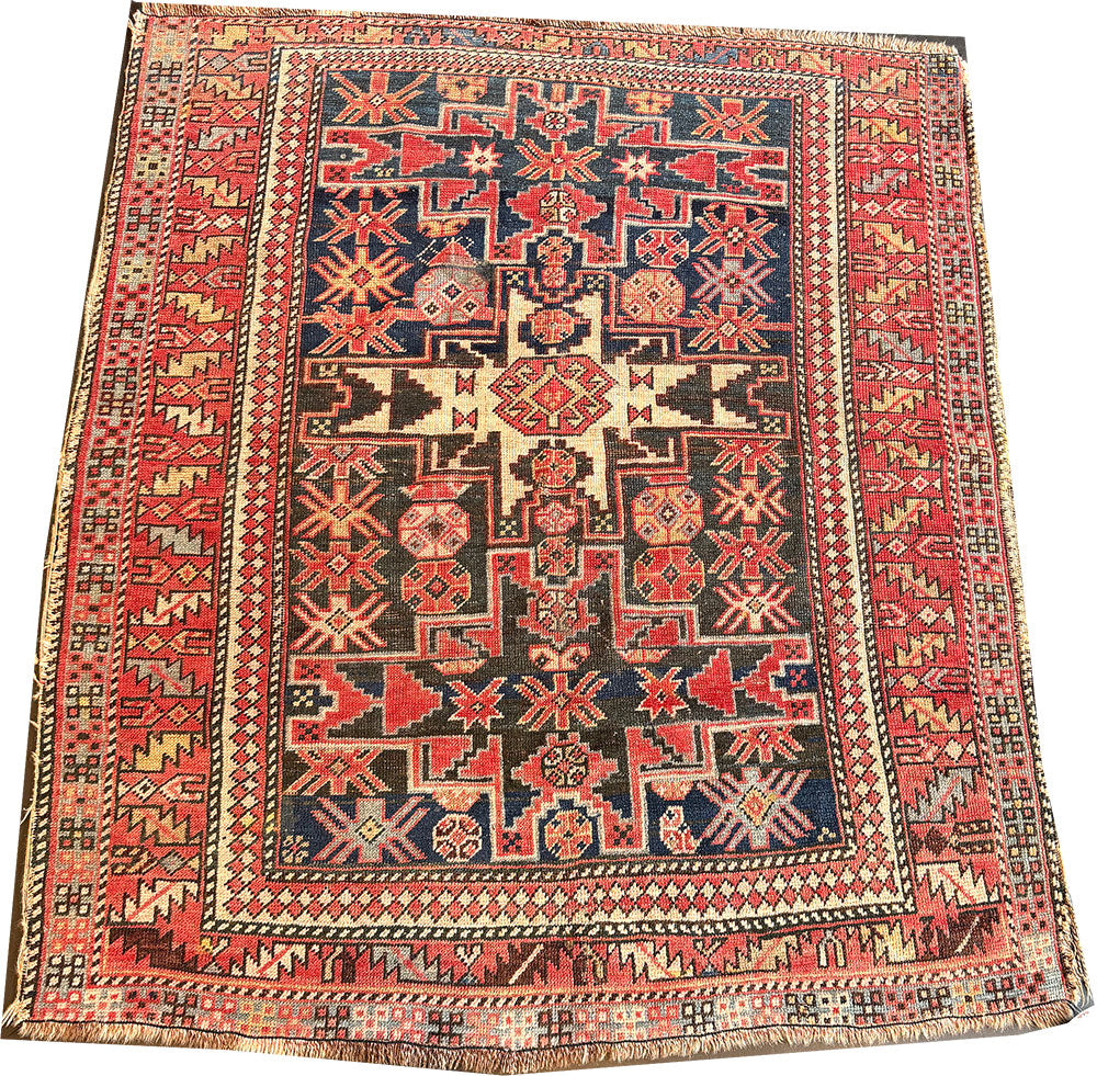 An Antique Caucasian Lesghi Star Area Rug