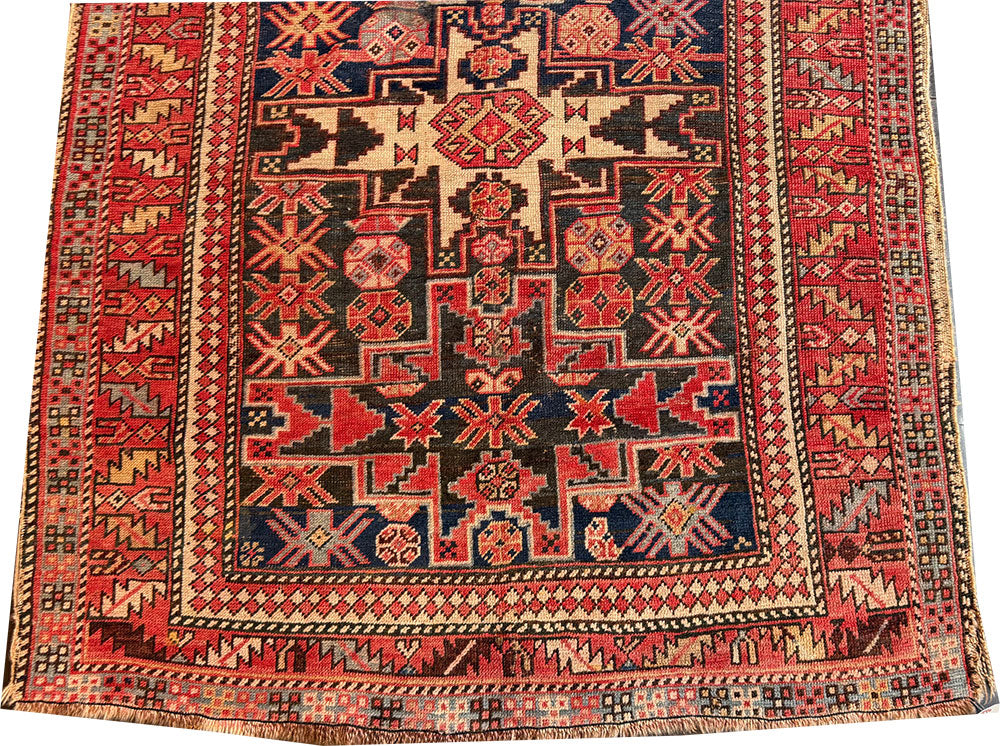 An Antique Caucasian Lesghi Star Area Rug