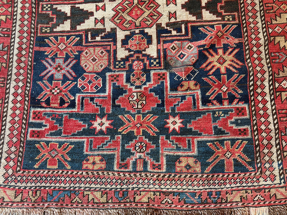An Antique Caucasian Lesghi Star Area Rug