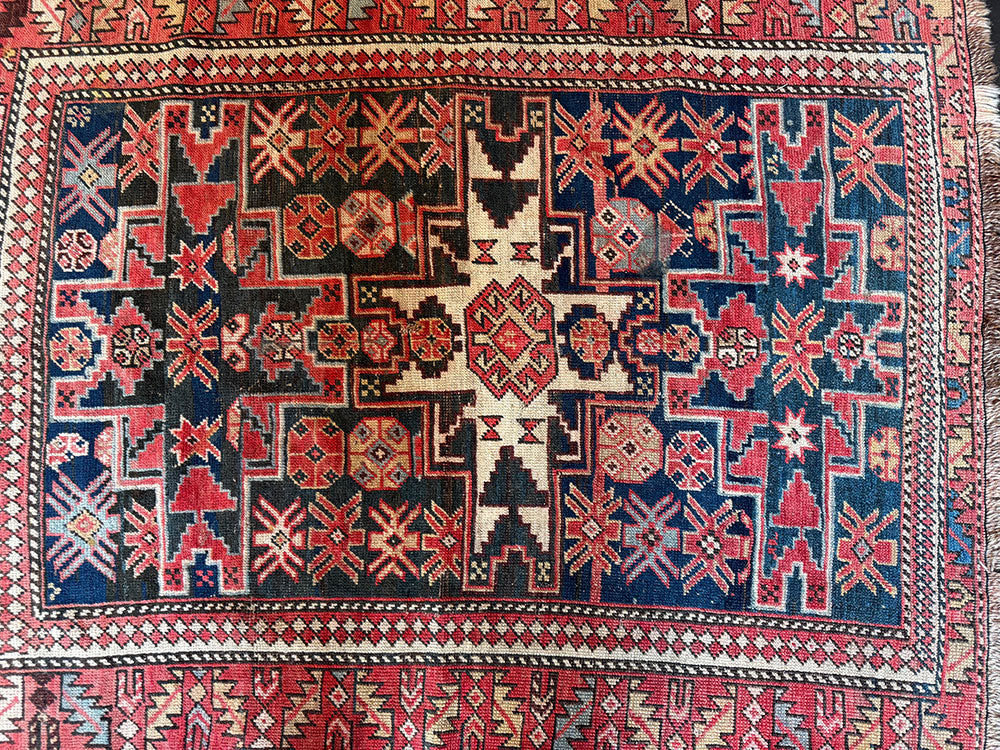 An Antique Caucasian Lesghi Star Area Rug