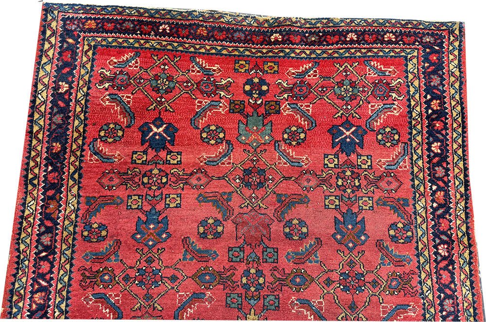 An Antique Decorative Persian Lilihan Rug