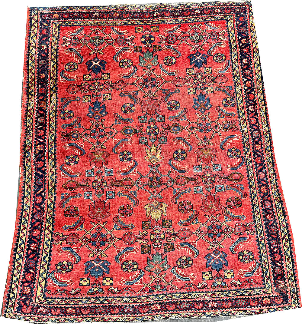 An Antique Decorative Persian Lilihan Rug