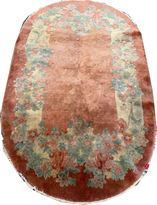 An Antique Oval 5' x 7' Art Deco Chinese Rug