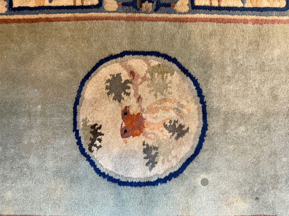 An Antique 2' x 4' Art Deco Chinese Rug
