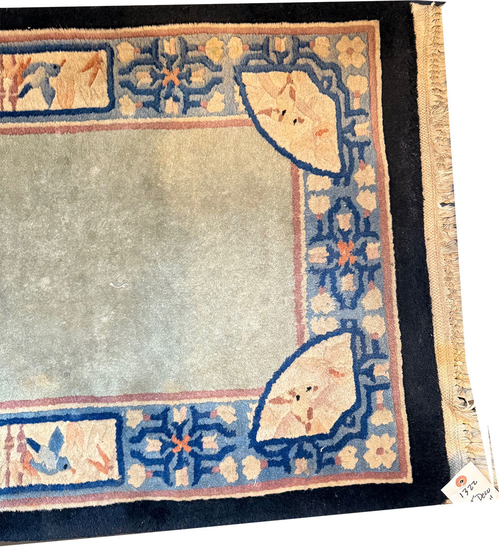 An Antique 2' x 4' Art Deco Chinese Rug