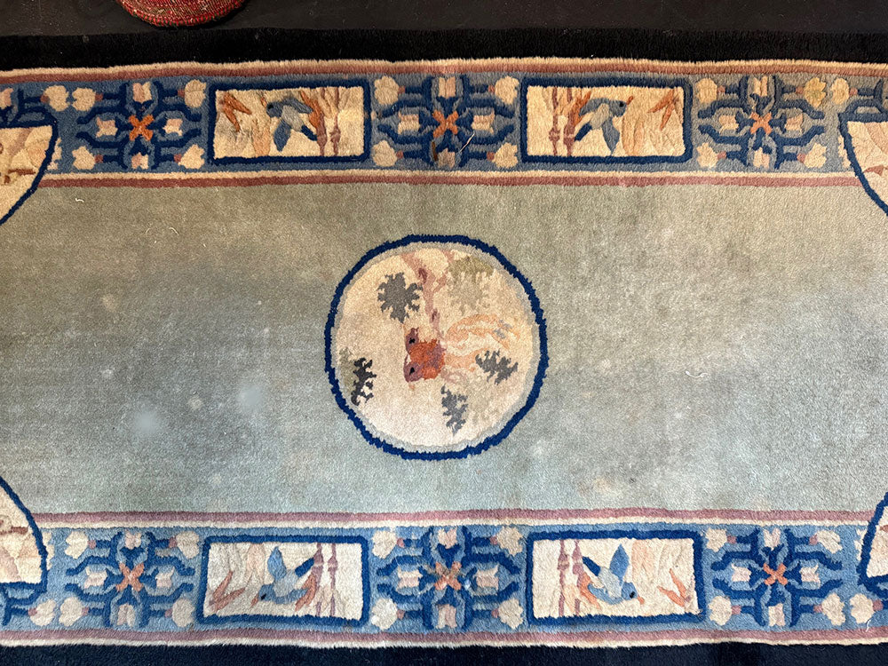 An Antique 2' x 4' Art Deco Chinese Rug