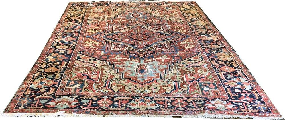 An Antique Decorative Persian Heriz Rug