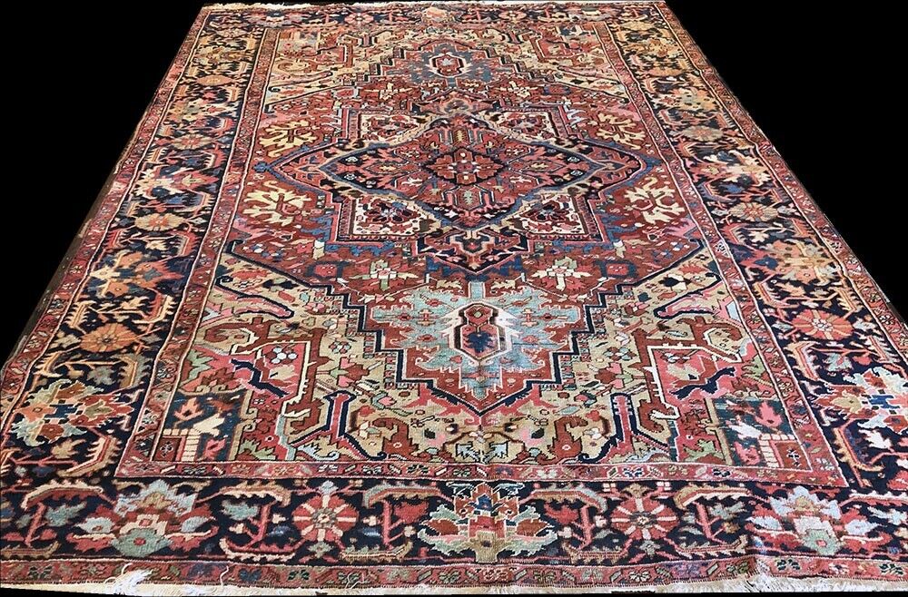 An Antique Decorative Persian Heriz Rug