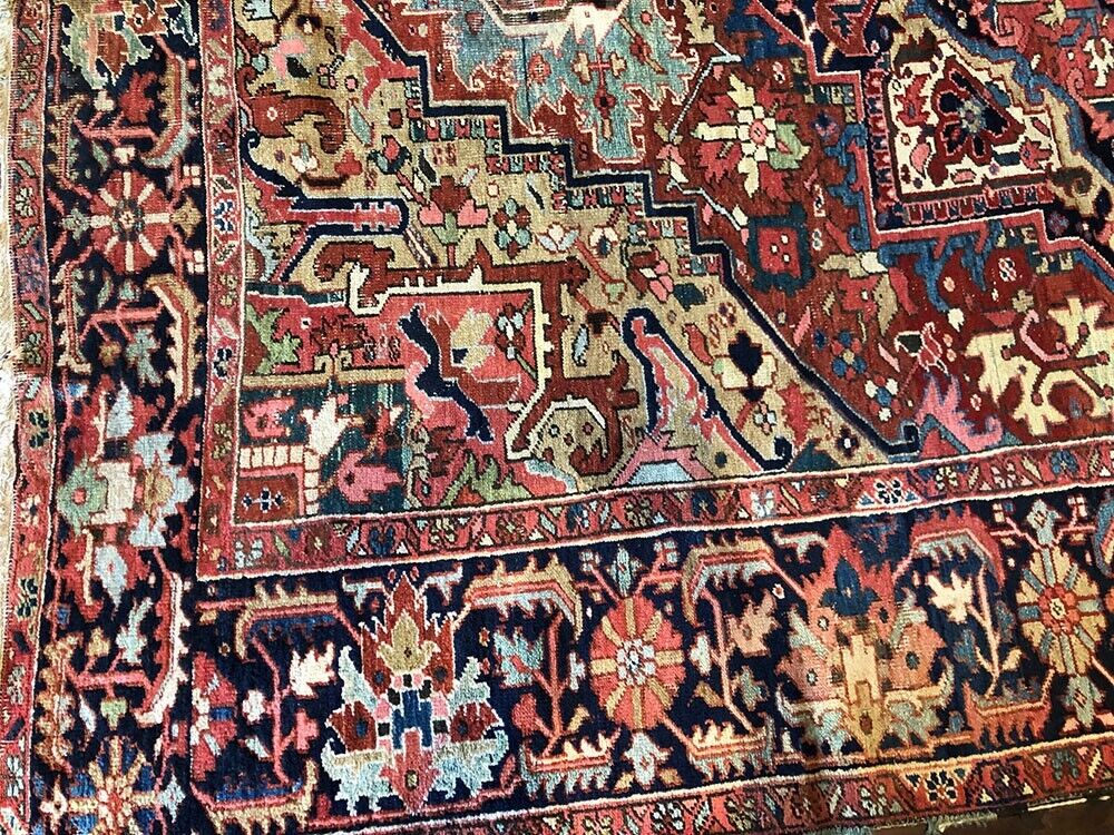 An Antique Decorative Persian Heriz Rug