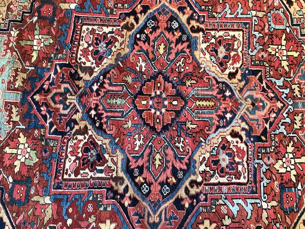 An Antique Decorative Persian Heriz Rug