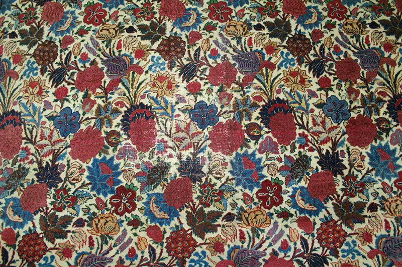 An Interesting Antique French Look Persian Mashad Rug