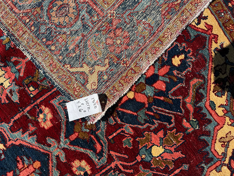 An Antique 4'-9" X 6'-11" Genuine Persian Heriz Circa 1920