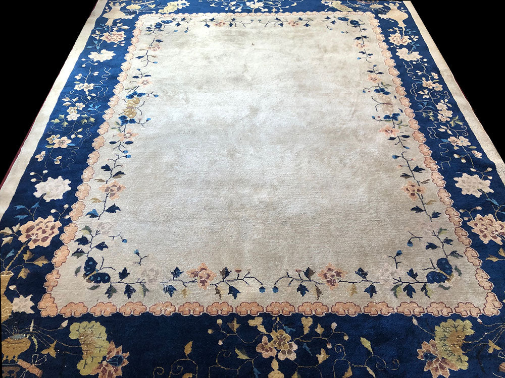 An Antique Plain Ground 8' x 10'Art Deco Chinese Rug