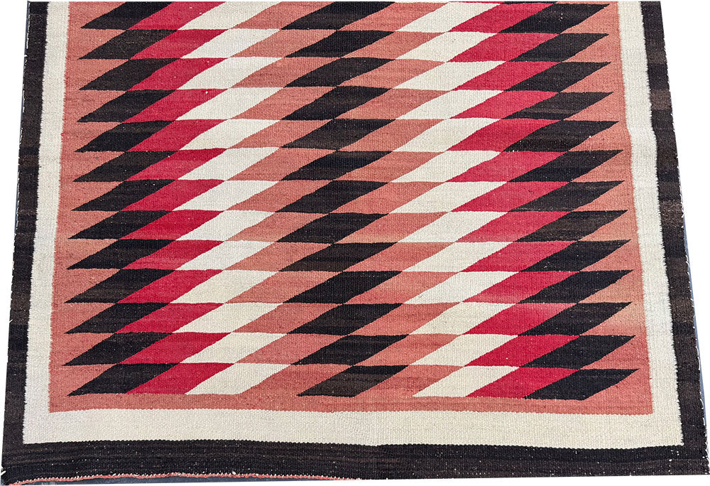 An Antique American Indian Eye Dazzle Navajo Flat Weavw Rug