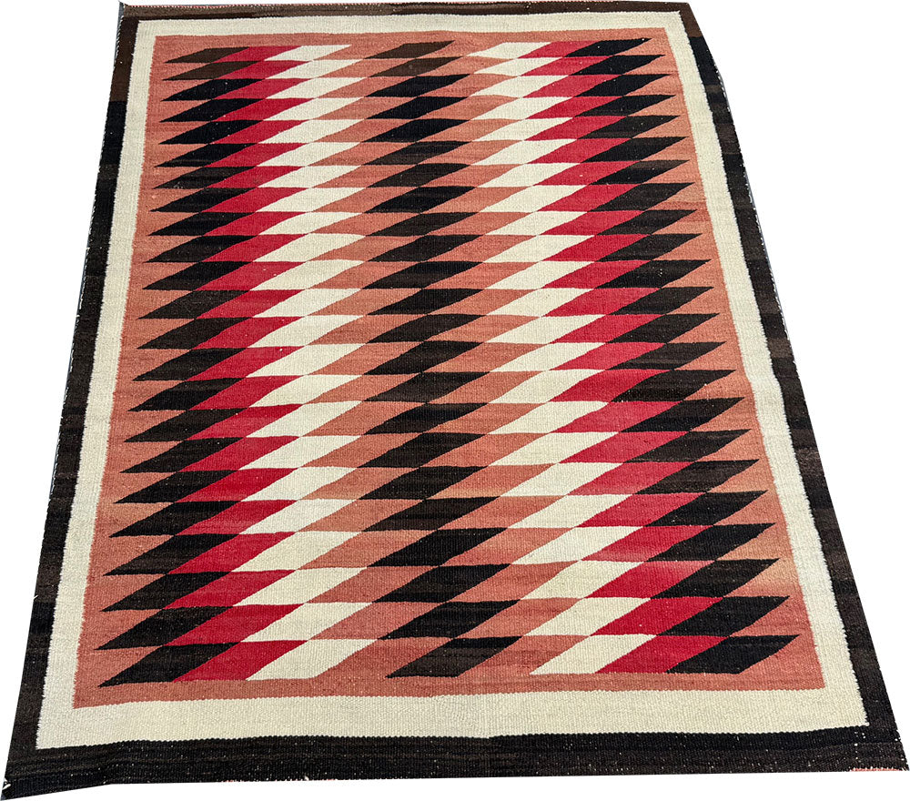 An Antique American Indian Eye Dazzle Navajo Flat Weavw Rug