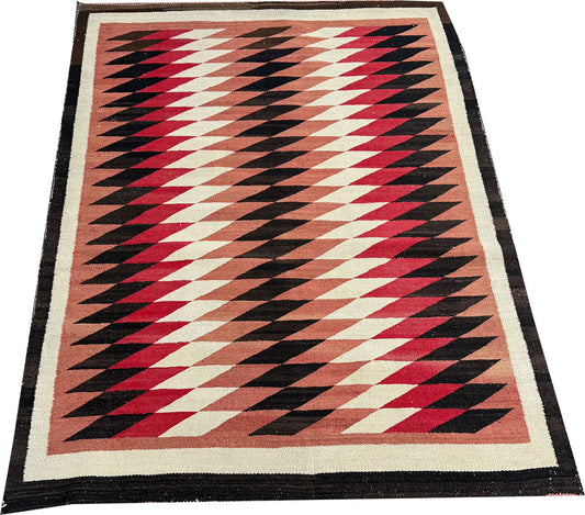 An Antique American Indian Eye Dazzle Navajo Flat Weavw Rug