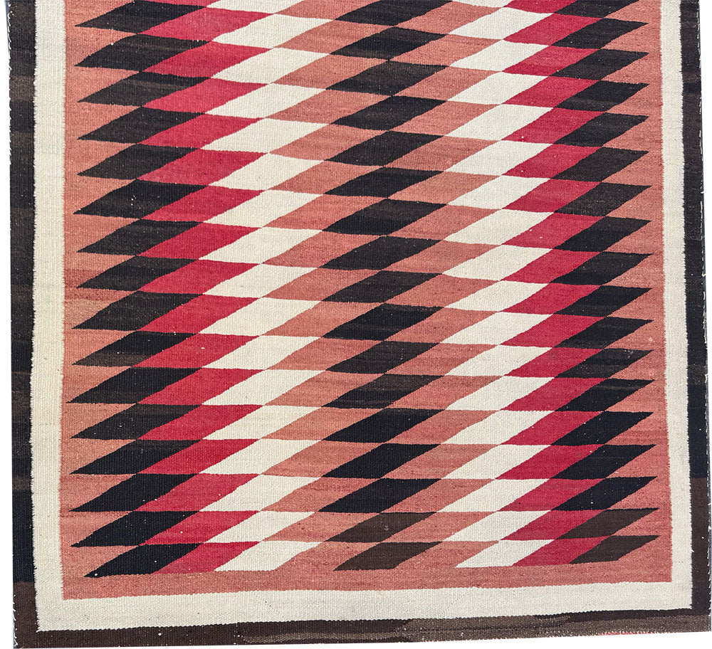 An Antique American Indian Eye Dazzle Navajo Flat Weavw Rug