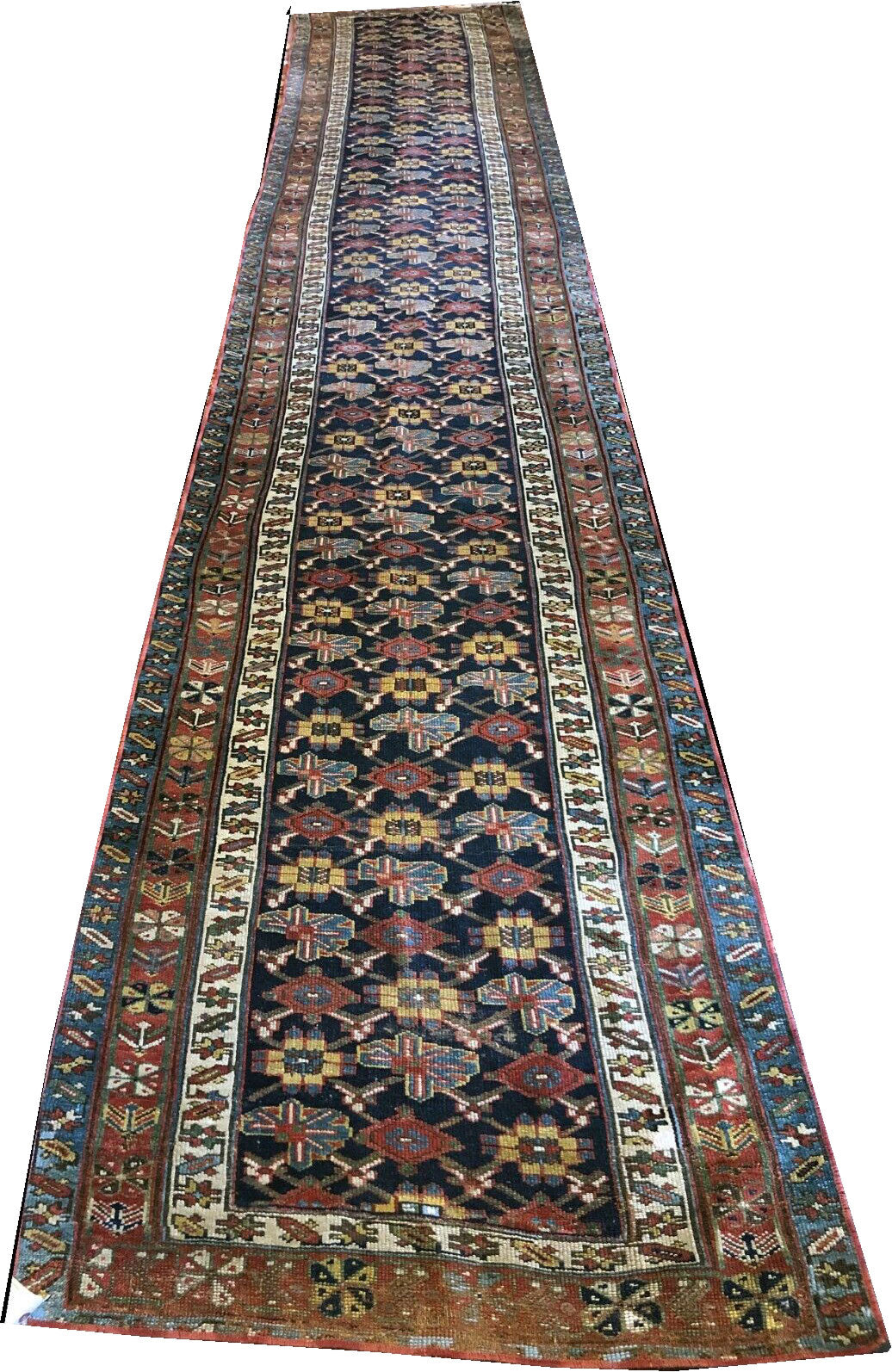 An Antique 17' Long NW Persian Hallway Runner Rug