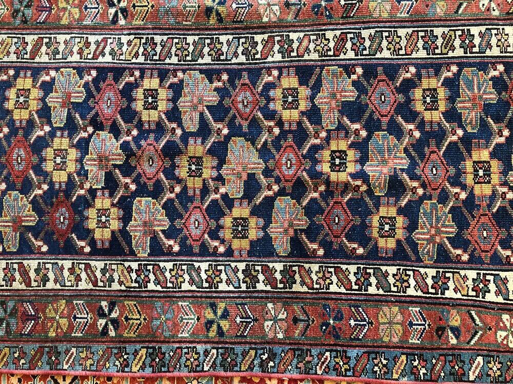 An Antique 17' Long NW Persian Hallway Runner Rug