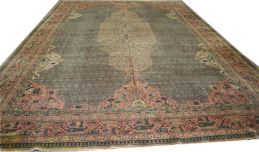 An Antique 12' x 18' Green Ground Turkish Sparta Rug