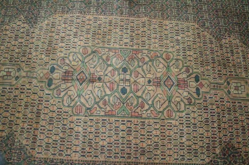 An Antique 12' x 18' Green Ground Turkish Sparta Rug