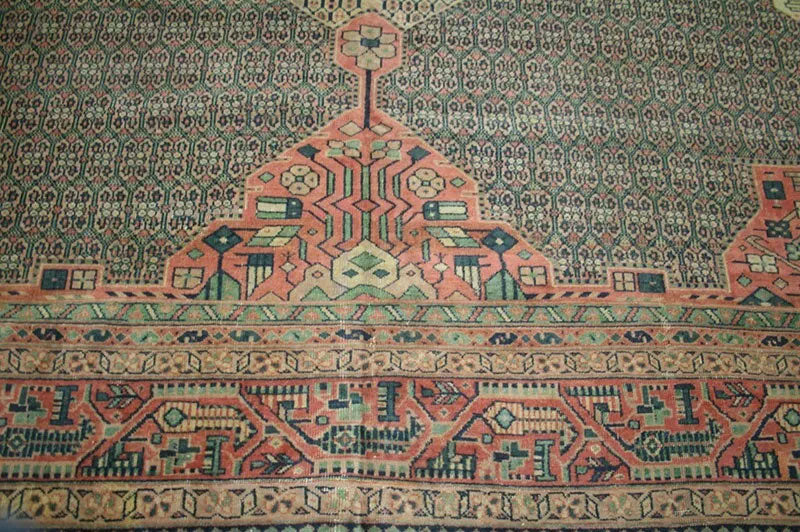 An Antique 12' x 18' Green Ground Turkish Sparta Rug